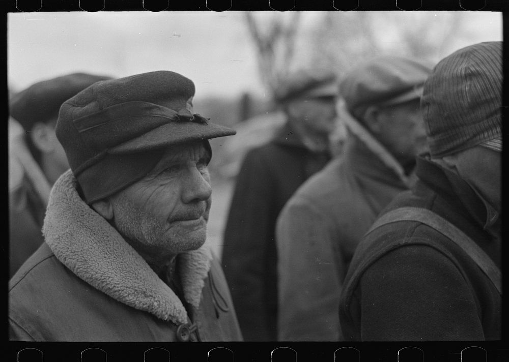 A farmer at a country auction near Aledo, Mercer County, Illinois by Russell Lee