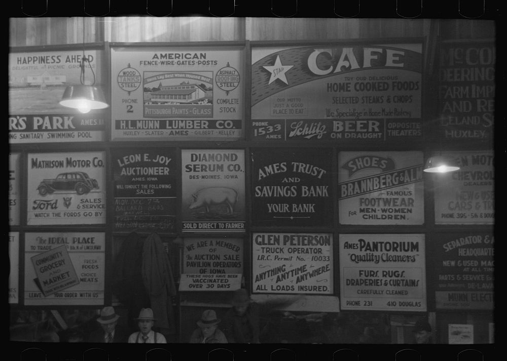 [Untitled photo, possibly related to: Advertising displays at livestock hall, Ames, Iowa] by Russell Lee