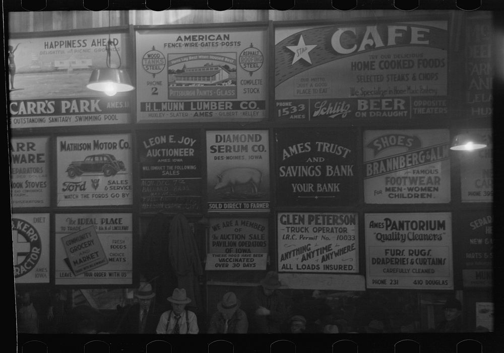 Advertising displays at livestock hall, Ames, Iowa by Russell Lee
