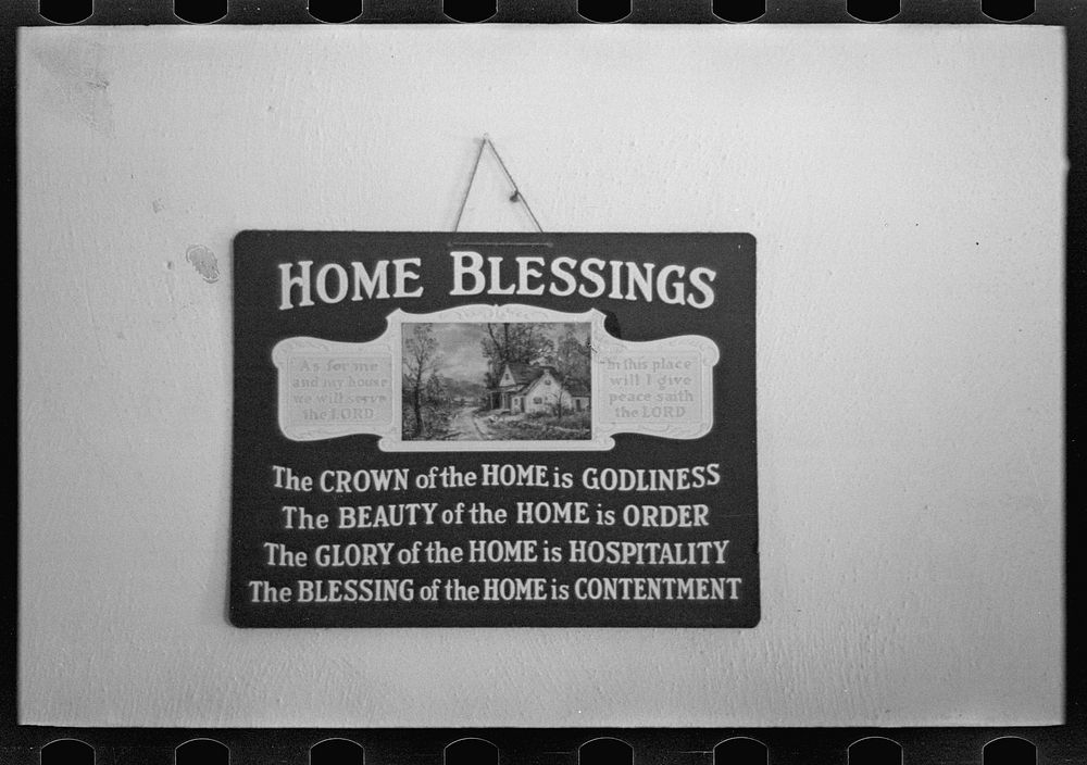Sign in J.E. Herbrandson's farmhouse near Estherville, Iowa by Russell Lee