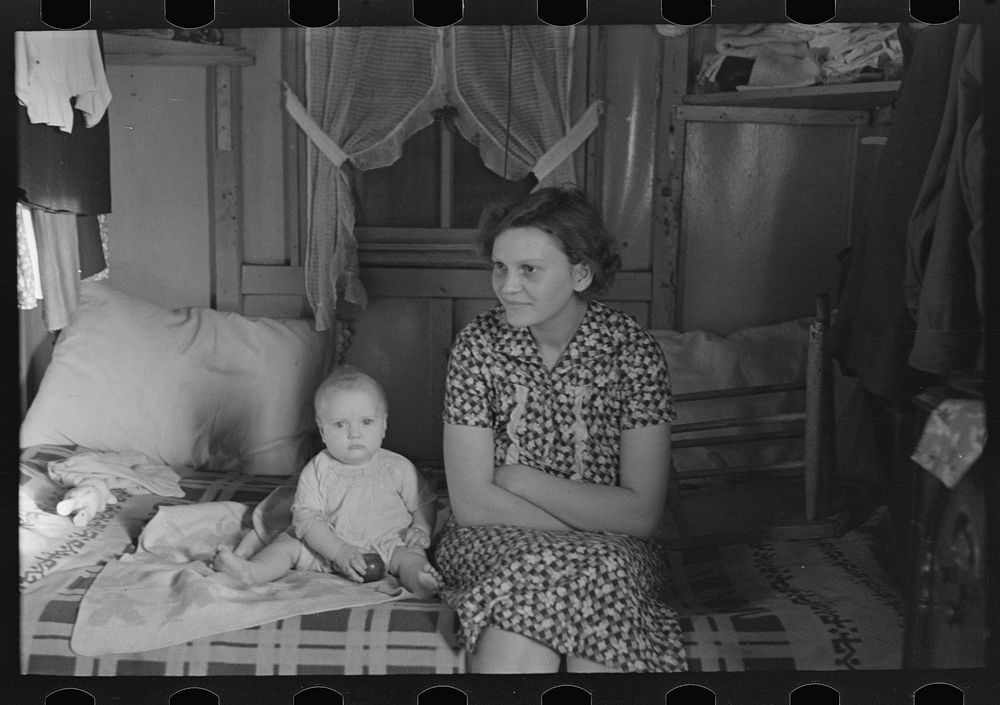 [Untitled photo, possibly related to: Mrs. Charles Benning and baby in their shack home at Shantytown, Spencer, Iowa] by…