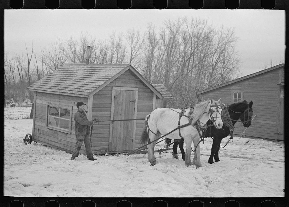 Moving transportable house. Roy Merriot farm near Estherville, Iowa by Russell Lee