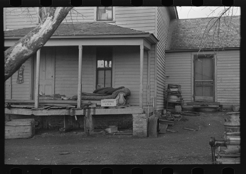 Front porch of house occupied by Mrs. Mary Kelsheiner and sons, Miller Township, Woodbury County, Iowa by Russell Lee