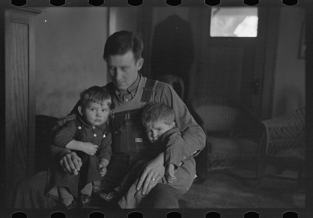 [Untitled photo, possibly related to: J. Donnell Champion and his two children who received a start from resettlement two…