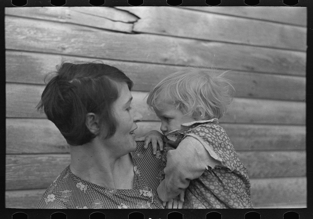 [Untitled photo, possibly related to: Mrs. Ed Boltinger and one of her children on farm near Ringgold, Iowa] by Russell Lee