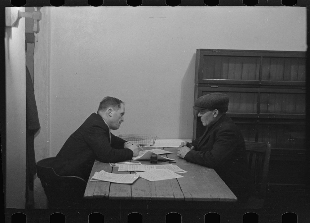 Farmer applying for feed loan, resettlement office, Sioux City, Iowa by Russell Lee