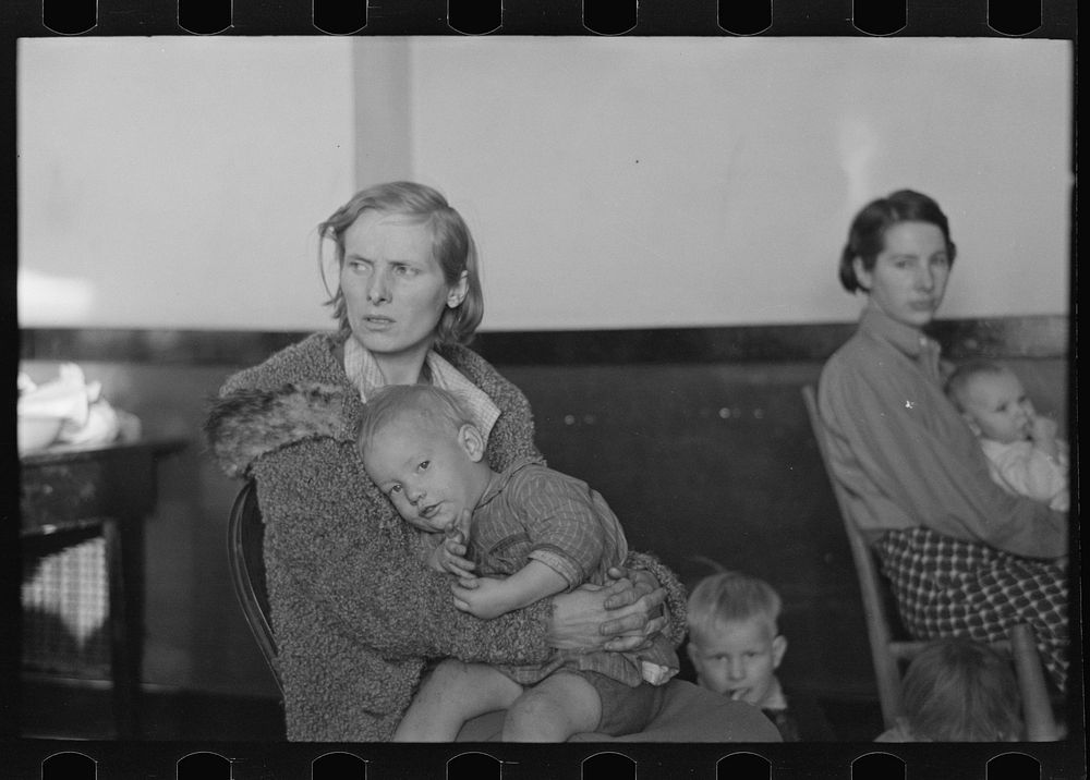 Mother and child, flood refugees in a schoolhouse at Sikeston, Missouri by Russell Lee
