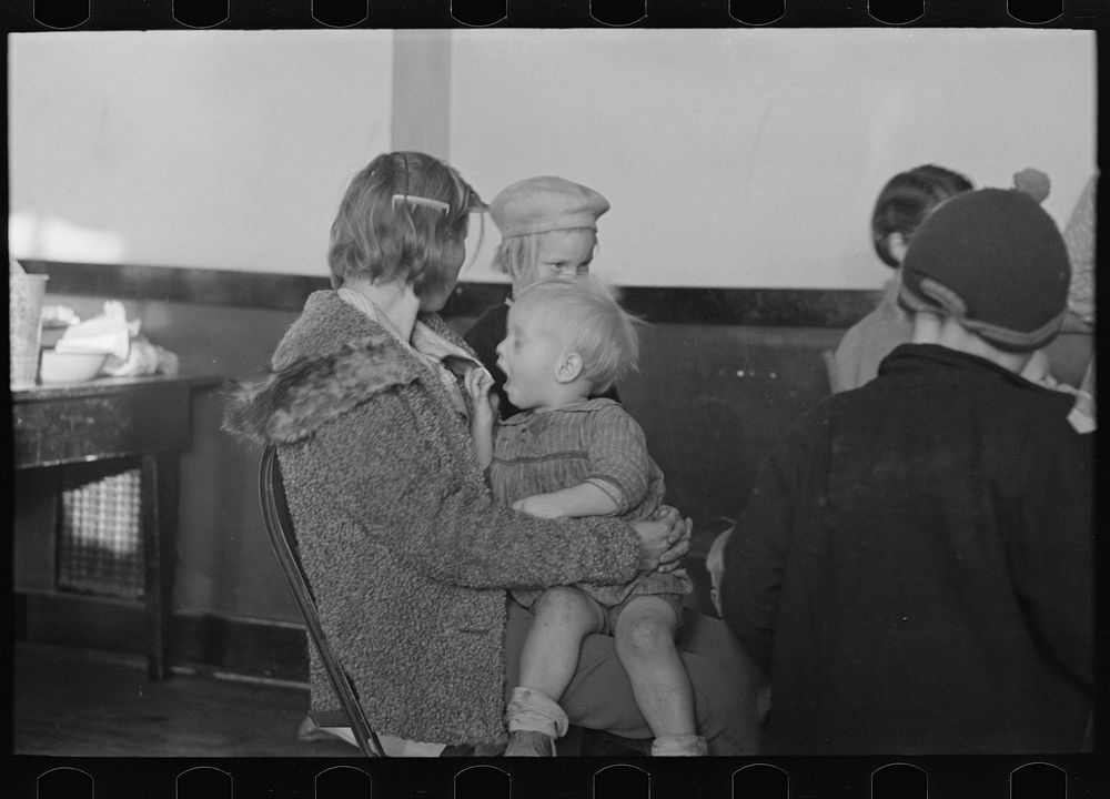 [Untitled photo, possibly related to: Mother and child, flood refugees in a schoolhouse at Sikeston, Missouri] by Russell Lee