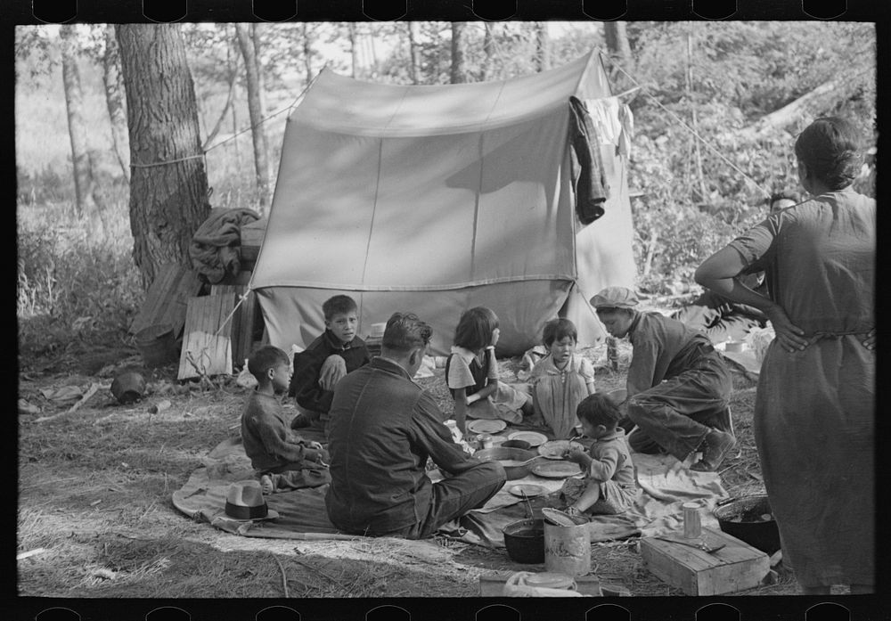 Indian family eating near Little Fork, Minnesota by Russell Lee