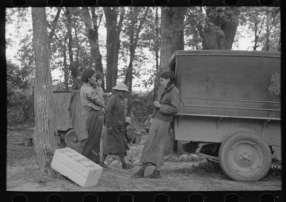 Blueberry pickers getting ready to go into the fields, near Little Fork, Minnesoat by Russell Lee