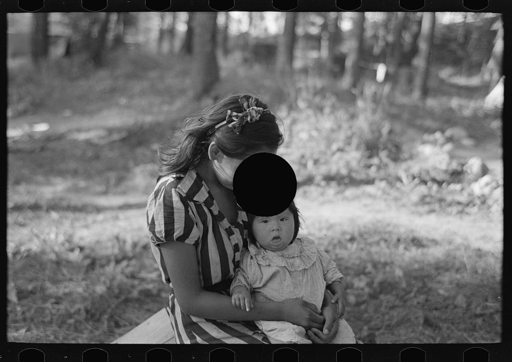[Untitled photo, possibly related to: Young Indian mother and baby, blueberry camp, near Little Fork, Minnesota] by Russell…