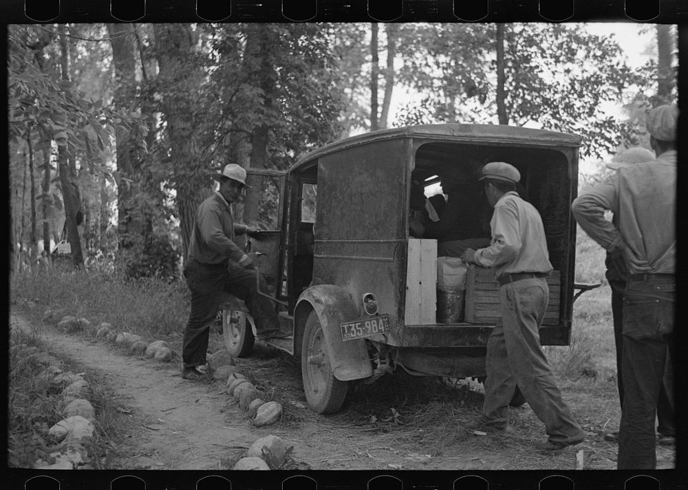[Untitled photo, possibly related to: Blueberry pickers preparing to go to the fields near Little Fork, Minnesota] by…