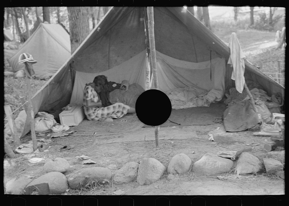 [Untitled photo, possibly related to: Interior of blueberry pickers' tent, near Little Fork, Minnesota] by Russell Lee