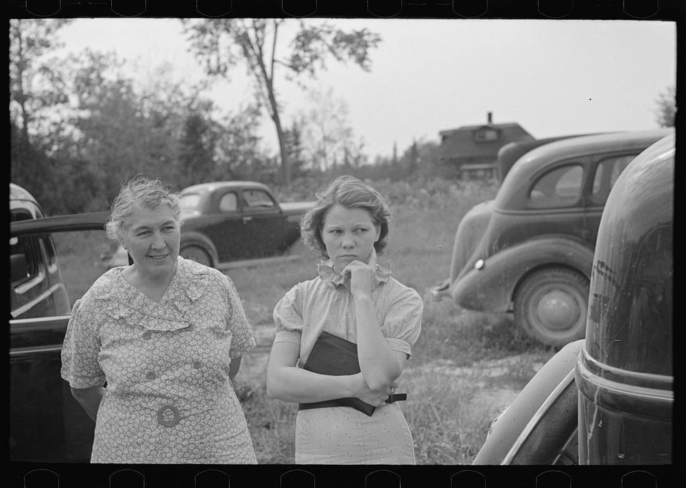 Women at auction sale, Orth, Minnesota by Russell Lee