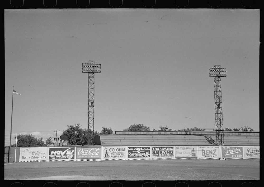 Signs and lighting standards at baseball park, Saint Paul, Minnesota by Russell Lee