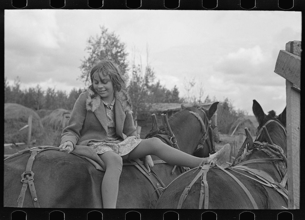 Girl astride mule, farm near Northome, Minnesota by Russell Lee