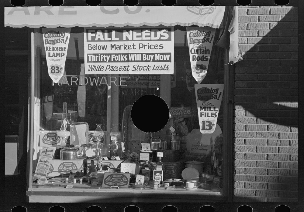 [Untitled photo, possibly related to: Hardware store window, Crosby, North Dakota] by Russell Lee