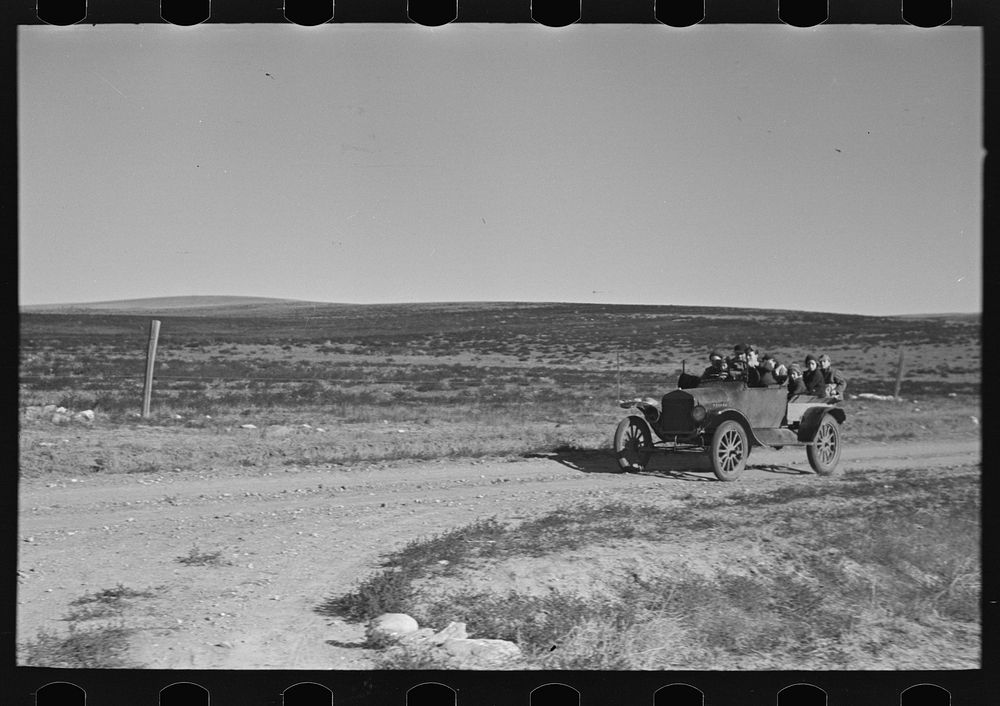 [Untitled photo, possibly related to: The Harshenberger [i.e. Harshbarger] family going to town in their car near Antelope…