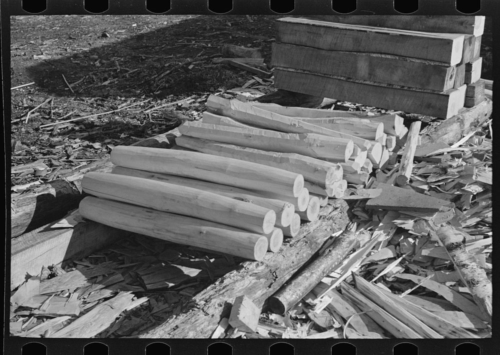 Pile of stakes made with broadaxe at camp near Effie, Minnesota by Russell Lee