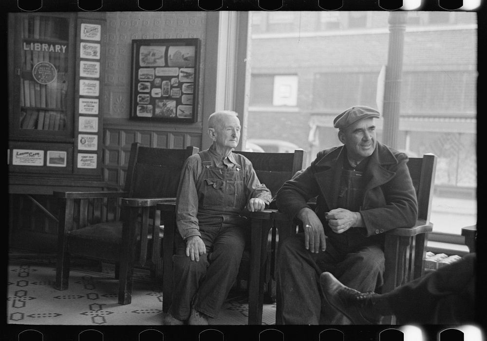 Men in the lobby of the Great Northern Hotel, Williston, North Dakota by Russell Lee