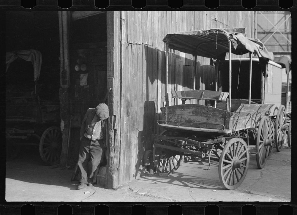 [Untitled photo, possibly related to: Old livery stable, East Side, New York City] by Russell Lee