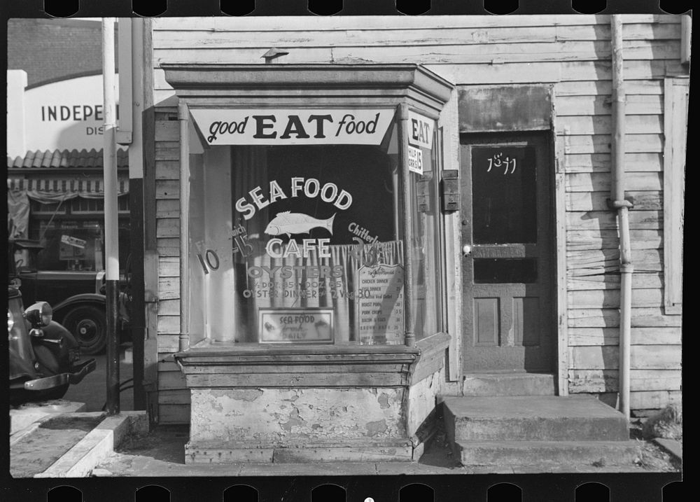 [Untitled photo, possibly related to: Shoe shop, L Street, Washington, D.C.] by Russell Lee