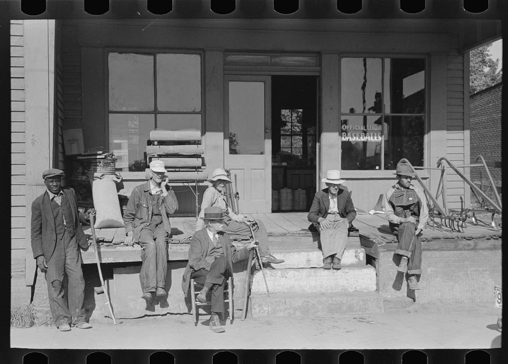 Men in front of store at Irvington, Kentucky by Russell Lee