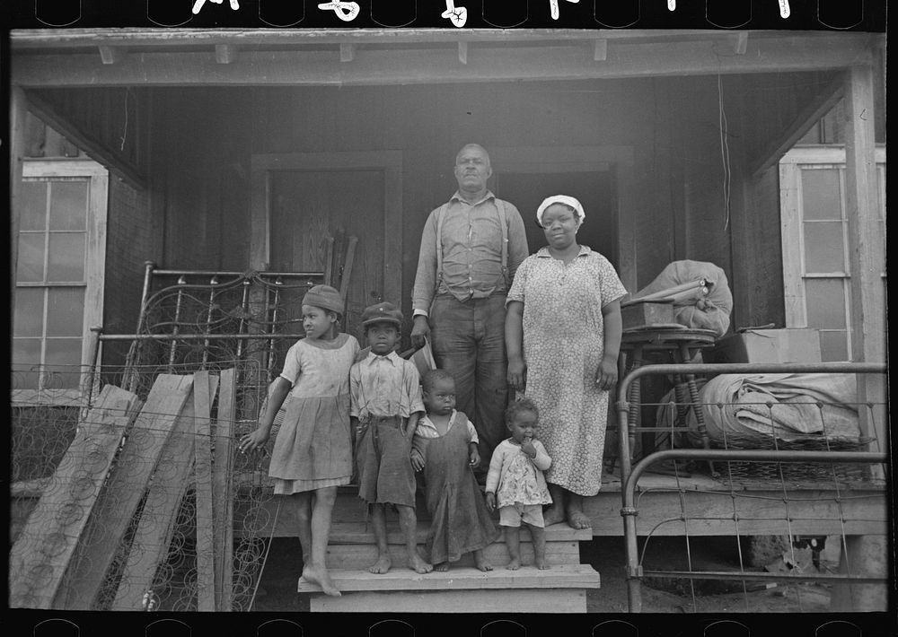 [Untitled photo, possibly related to: Mother and child, FSA (Farm Security Administration) clients, former sharecroppers…