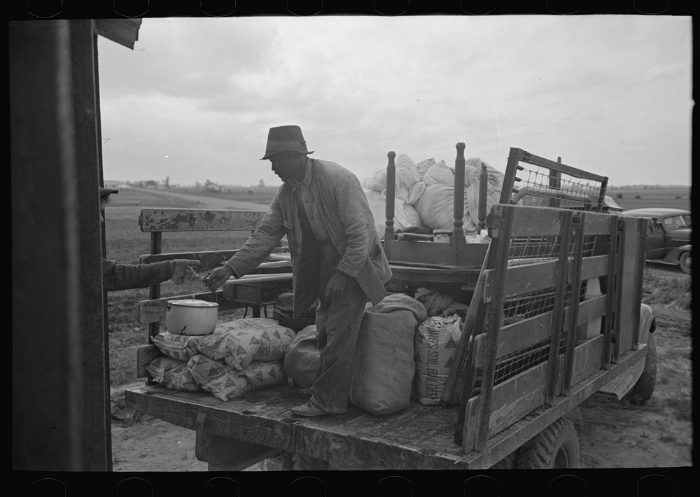 Southeast Missouri Farms. Loading truck in process of moving FSA (Farm Security Administration) client to new farm unit by…