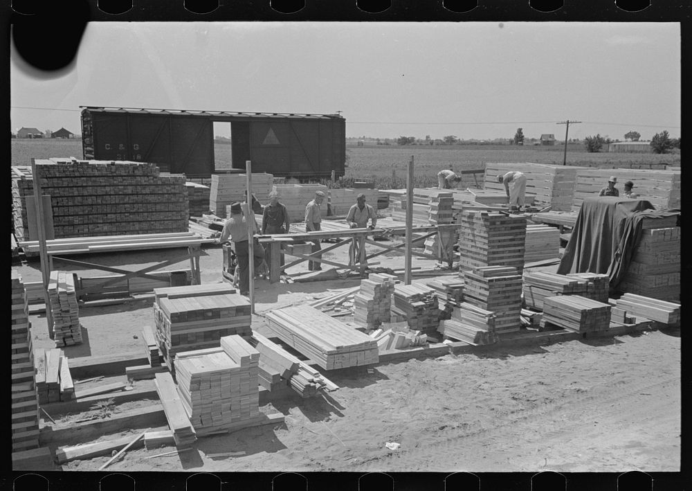 House plant. General view of precutting operation showing the precut material stacked and marked by Russell Lee