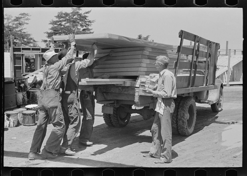 Delivery of materials. The standard house load being checked before leaving the yard. Southeast Missouri Farms Project by…