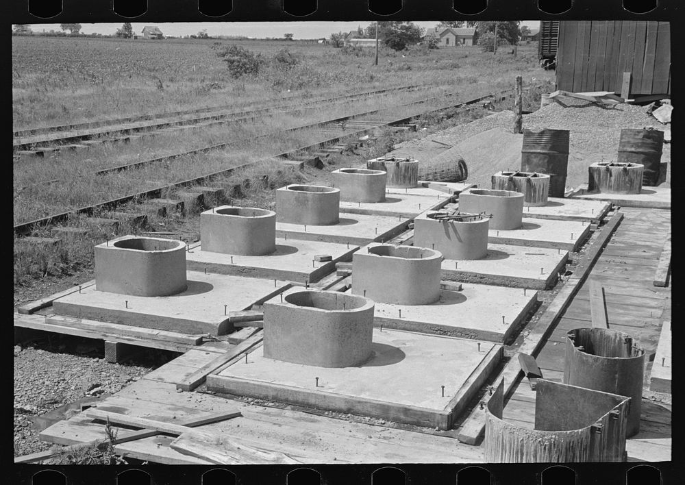 [Untitled photo, possibly related to: Privy plant. Sanitary pre-cast concrete privy bases after stripping of forms.…