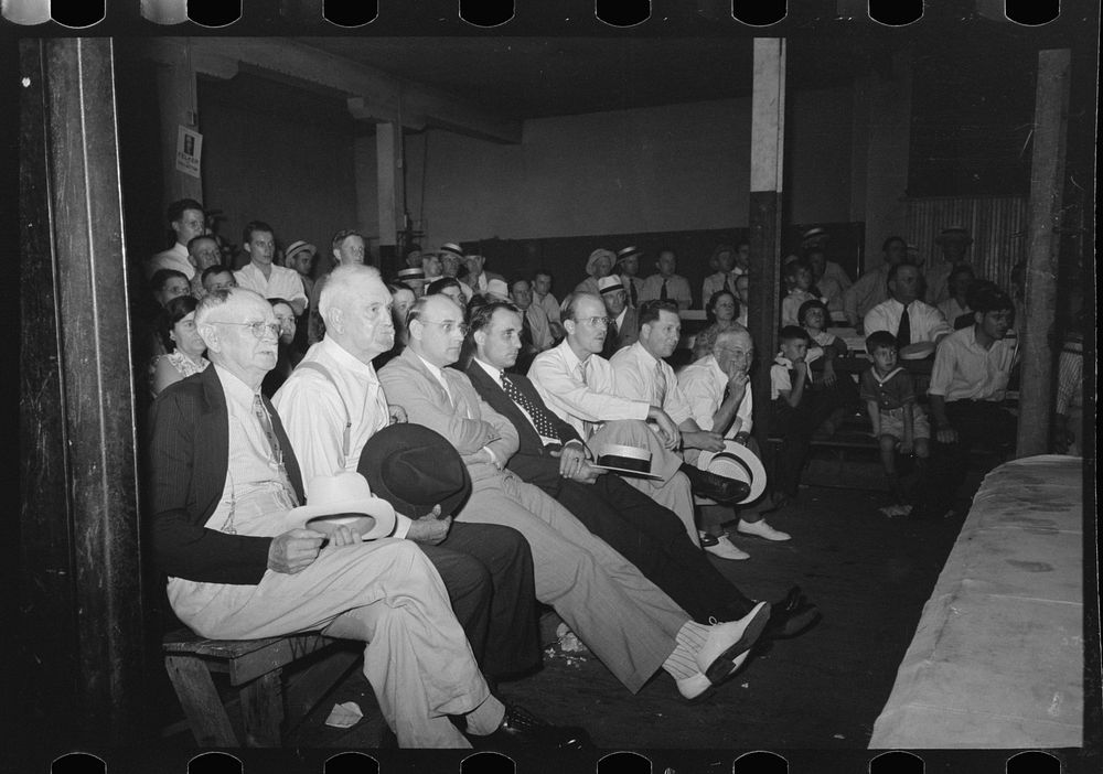 Spectators at wrestling match, Sikeston, Missouri by Russell Lee