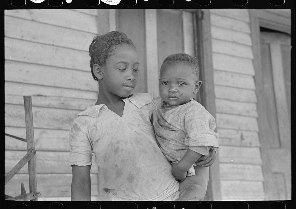 Children of FSA (Farm Security Administration) client, former sharecropper, Southeast Missouri Farms by Russell Lee