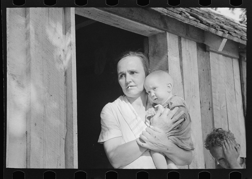 Wife and child of sharecropper, cut-over farmer of Mississippi bottoms by Russell Lee