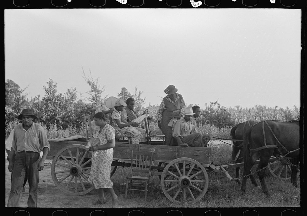 [Untitled photo, possibly related to:  clients arriving in wagon at meeting, Southeast Missouri Farms.] by Russell Lee