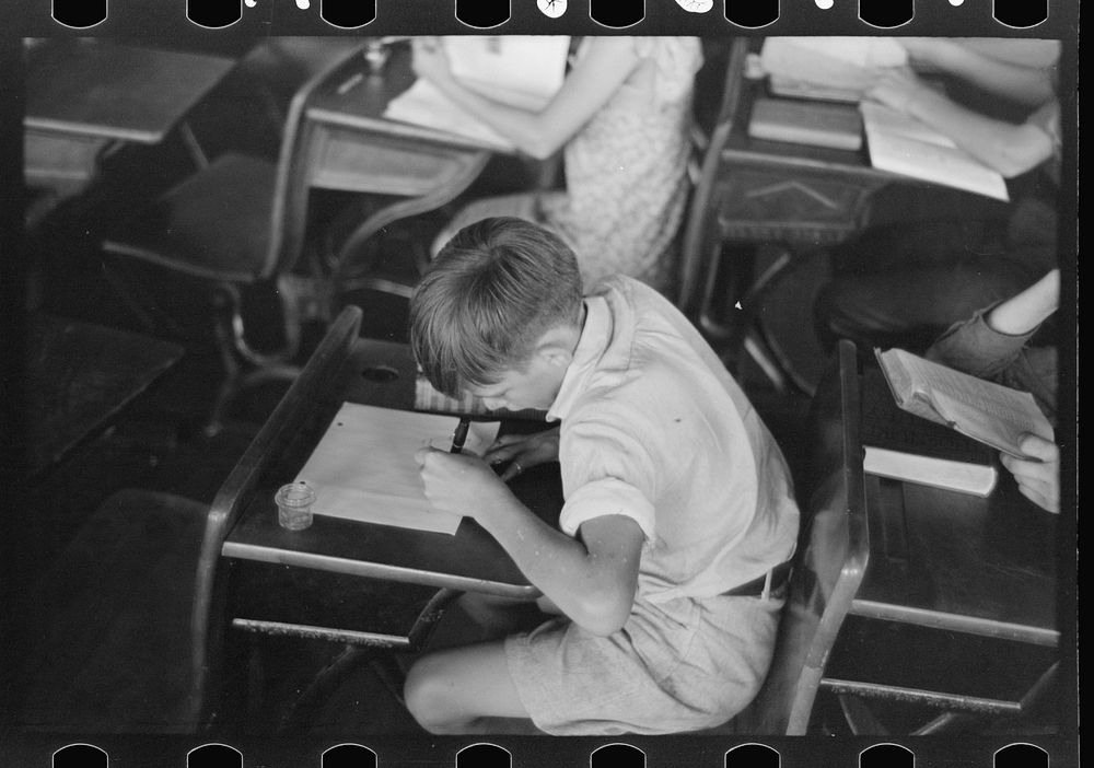 [Untitled photo, possibly related to: Child studying in school, Southeast Missouri Farms] by Russell Lee