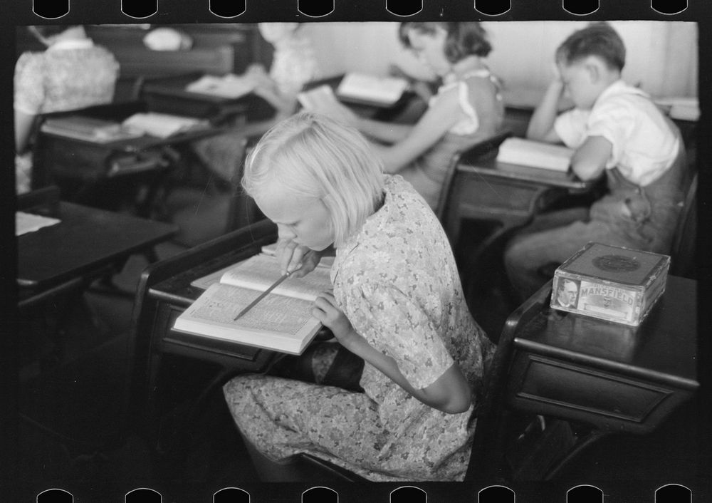 [Untitled photo, possibly related to: Child studying in school, Southeast Missouri Farms] by Russell Lee