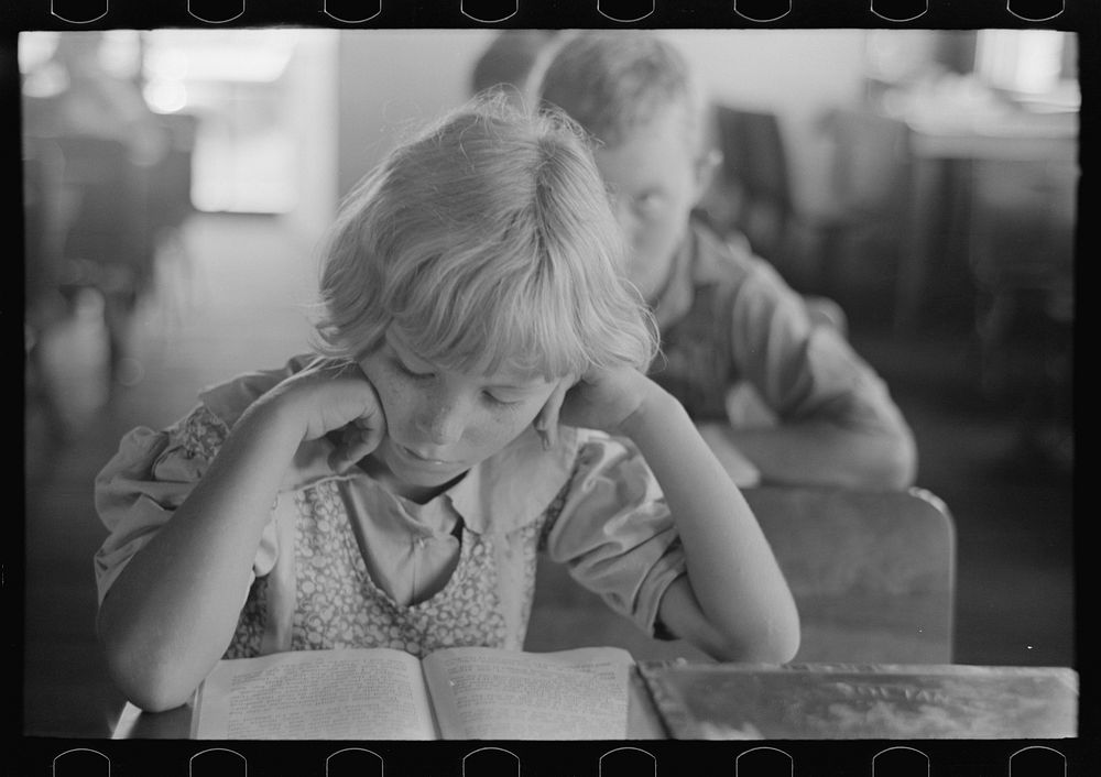 [Untitled photo, possibly related to: Child studying in school, Southeast Missouri Farms] by Russell Lee