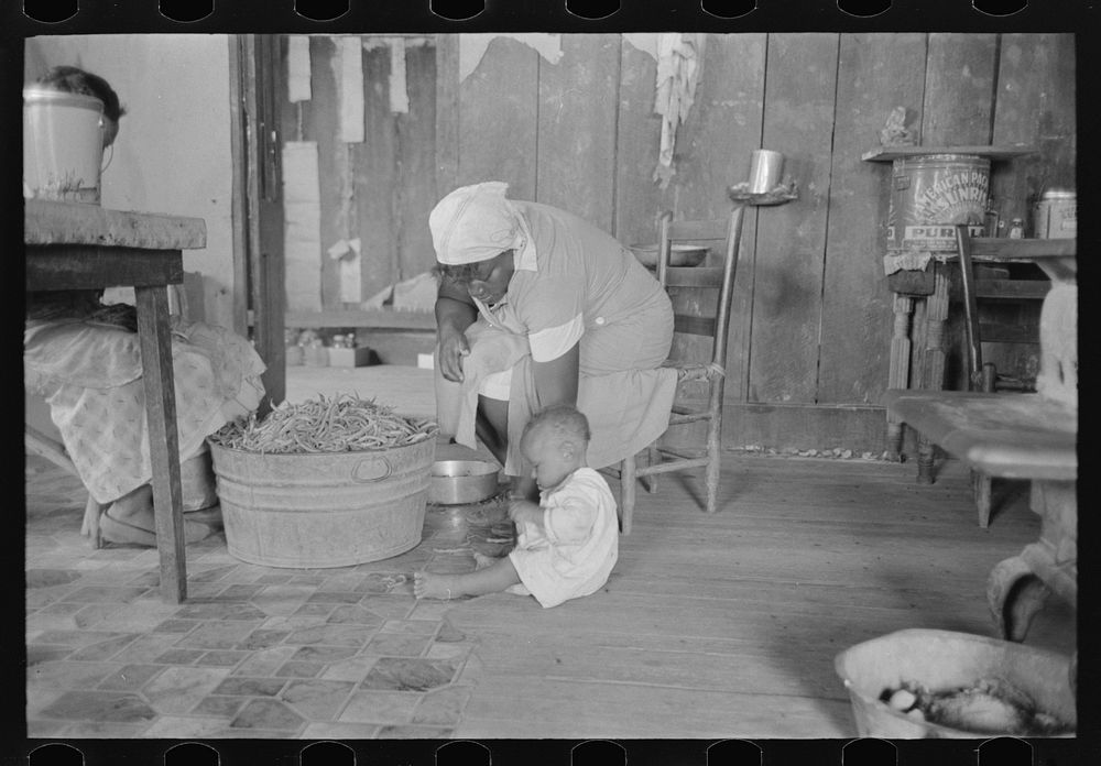New Madrid County, Missouri. Tub of stringbeans in sharecropper's home by Russell Lee