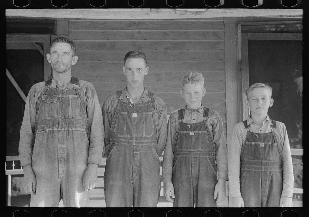 FSA (Farm Security Administration) client with three sons, Caruthersville, Missouri by Russell Lee