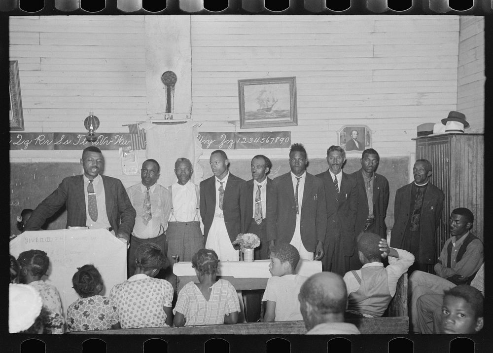  revival meeting, showing preacher and deacons, La Forge, Missouri by Russell Lee