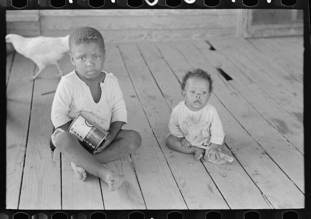 Background photograph. Children of FSA (Farm Security Administration) client who will become owner-operator under tenant…