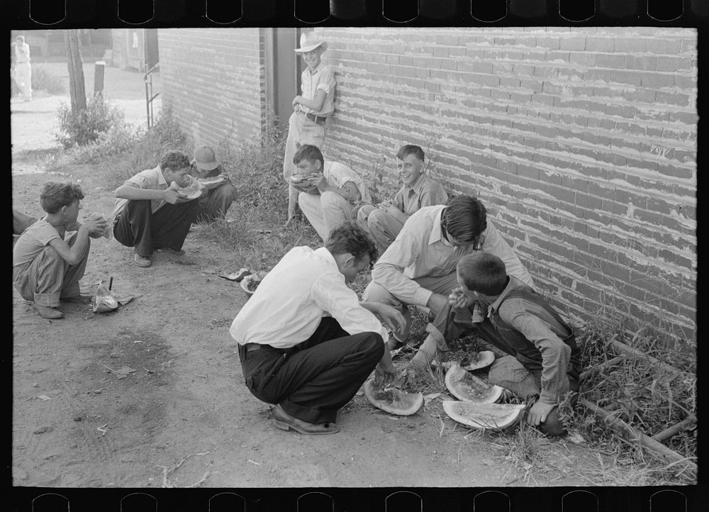 Natives eating watermelons, Steele, Missouri by Russell Lee
