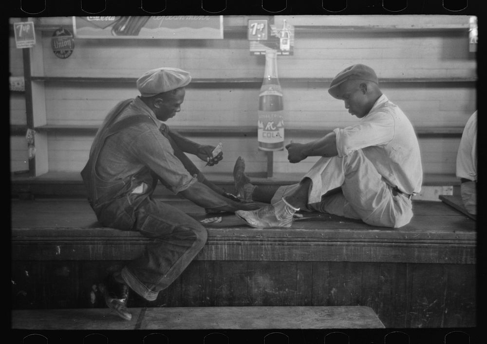 [Untitled photo, possibly related to: Game of coon-can in store near Reserve, Louisiana] by Russell Lee