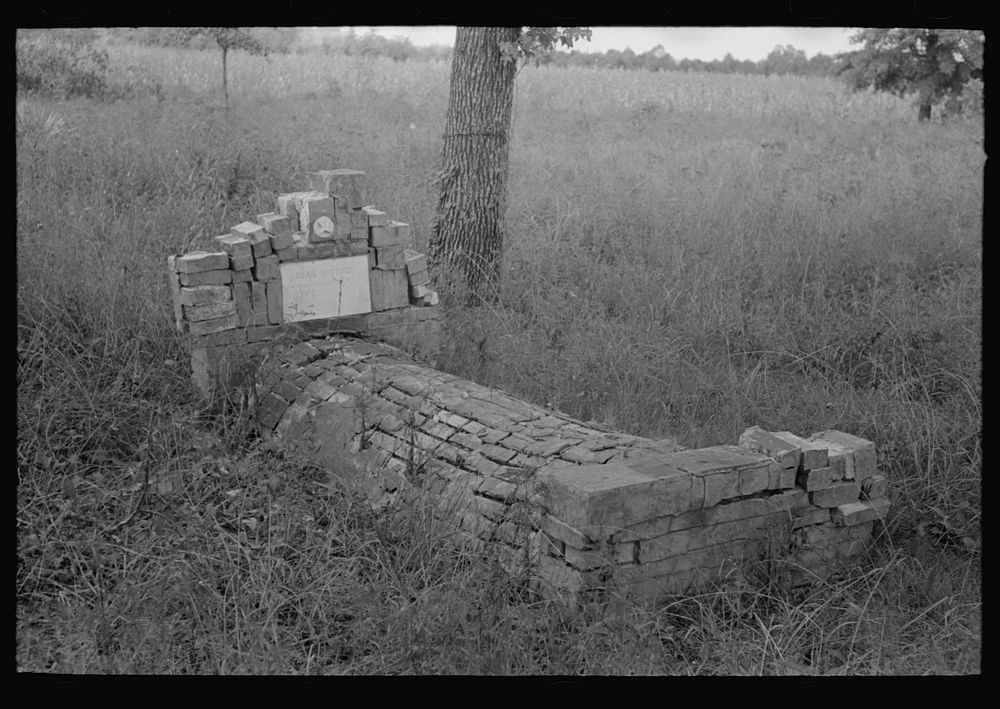 [Untitled photo, possibly related to: Old grave near Cruger, Mississippi] by Russell Lee