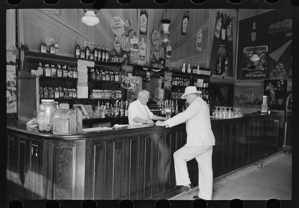 Saloon, Decatur Street, New Orleans, Louisiana by Russell Lee