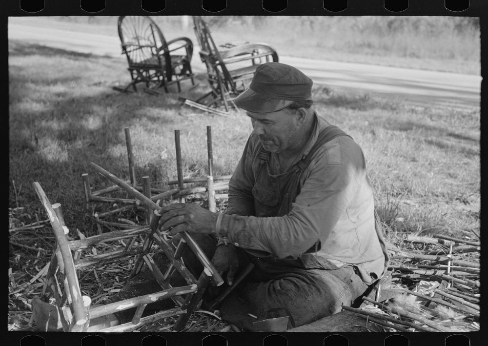 Migrant worker making cane chairs, near Paradis, Louisiana by Russell Lee