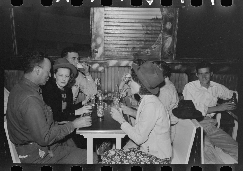 [Untitled photo, possibly related to: Drinking at the bar, saloon, Raceland, Louisiana] by Russell Lee