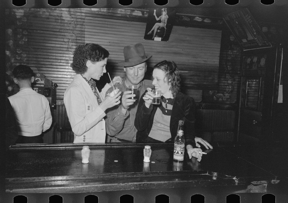 Drinking at the bar, saloon, Raceland, Louisiana by Russell Lee